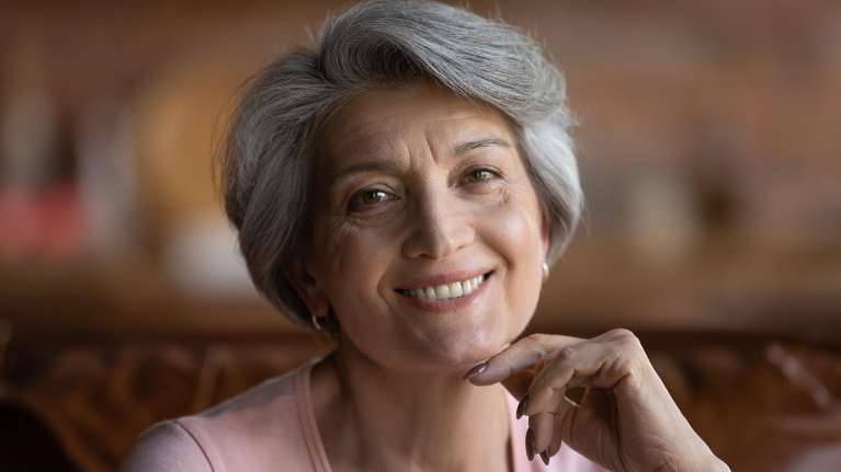 A smiling elderly lady after an Emergency Dentistry in Neutral Bay, NSW